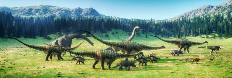 Skupina dinosaurů s dlouhým krkem na zelené louce před lesy.