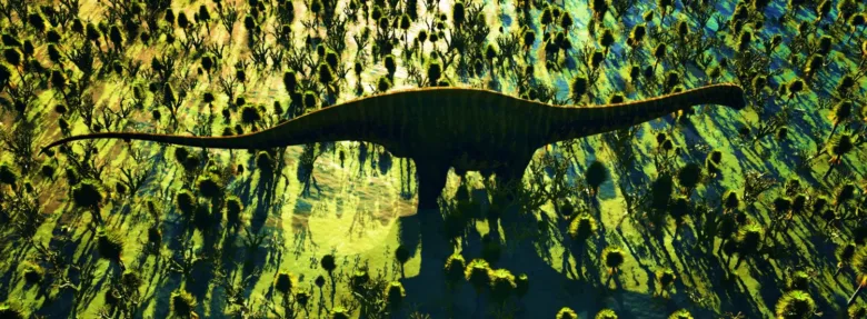 Velký dinosaurus diplodocus kráčí mezi starověkou vegetací.