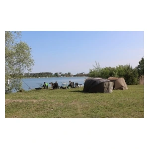 People fishing by lake